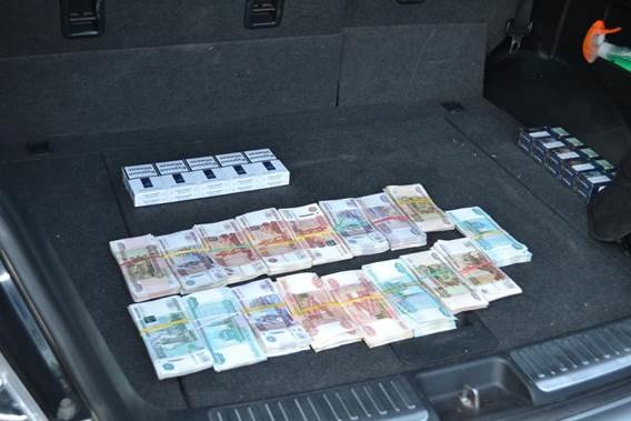 В Запорожской области СБУ заблокировала схему незаконного обмена денег, украденных в Луганске (фото) - фото 1
